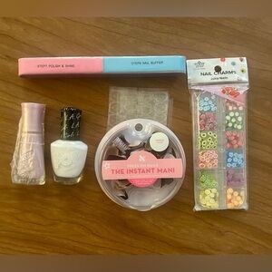 NWT NAIL SET- 2 Polishes, 6 sided file, Nail Charms, 100+ random press on nails!
